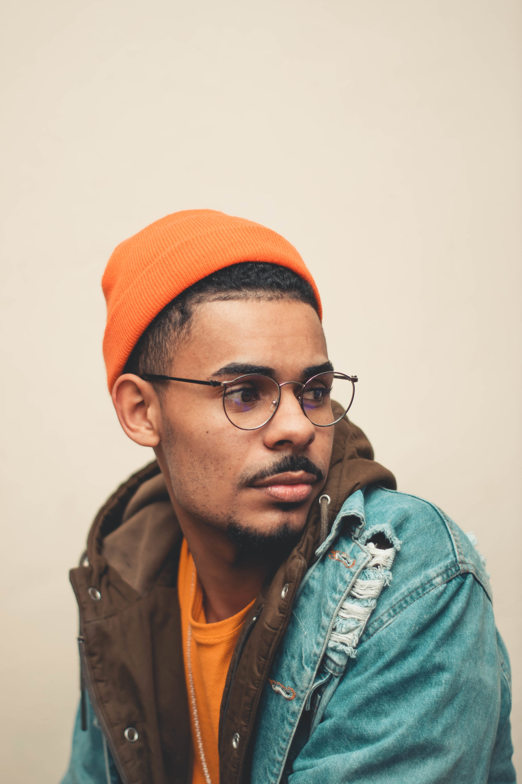 photo-of-man-wearing-orange-beanie-2801538